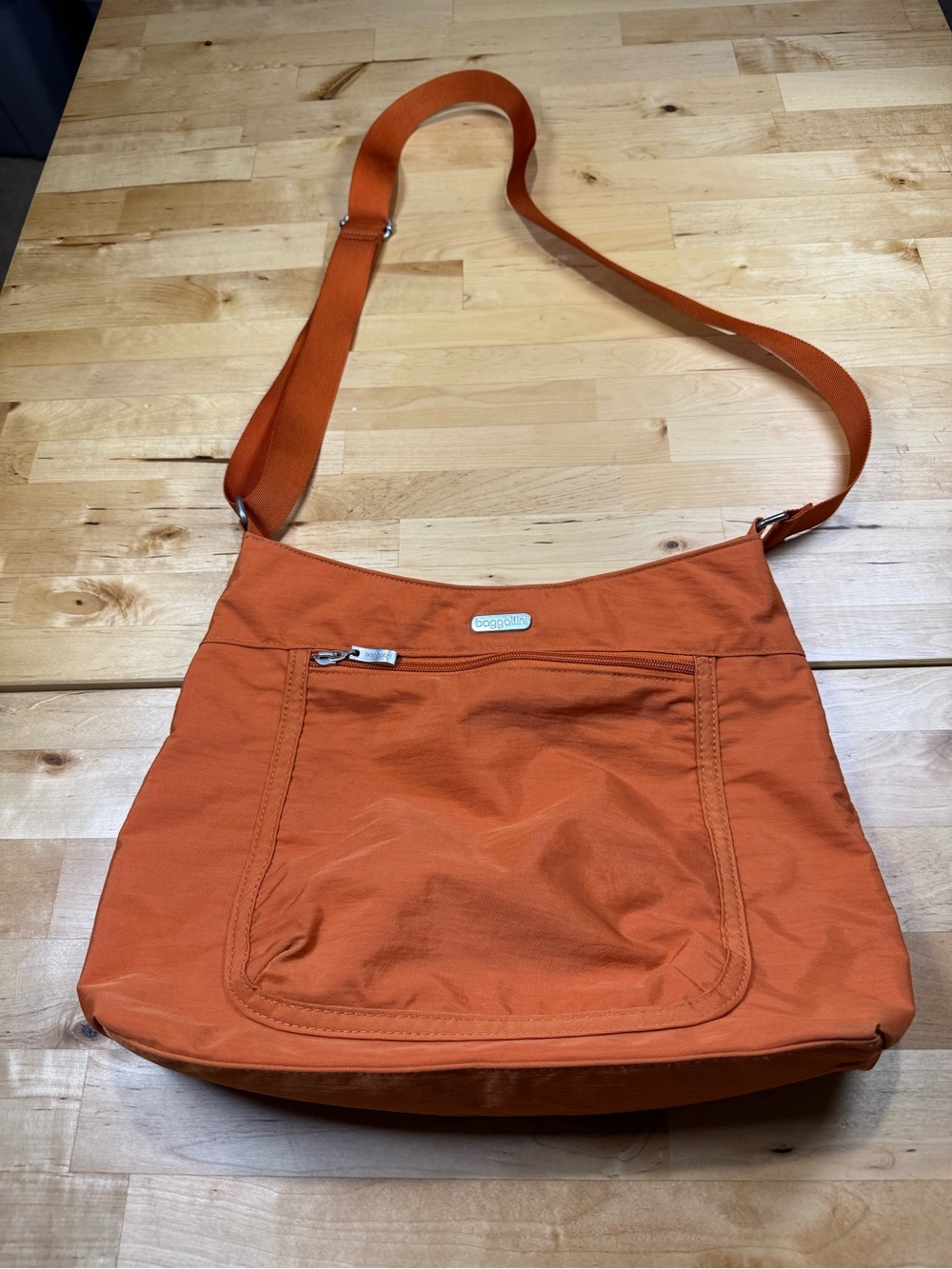 Baggallini Vibrant Orange Nylon Town Crossbody with Silver Logo